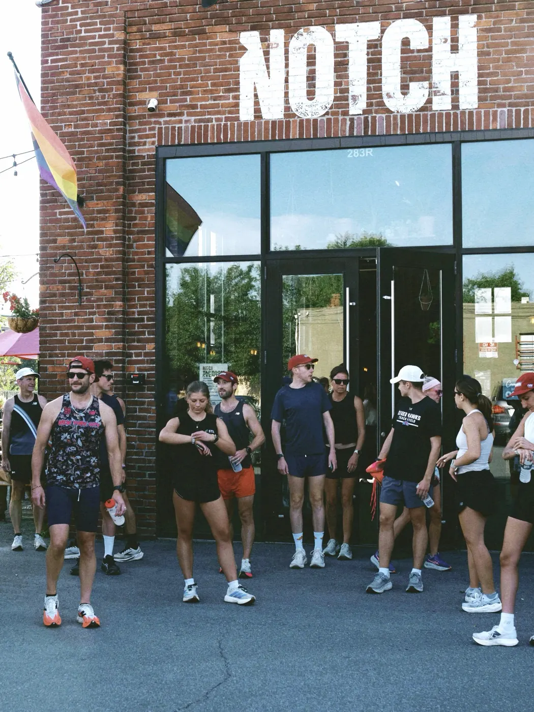 Runners chatting outside the meetup venue after a run